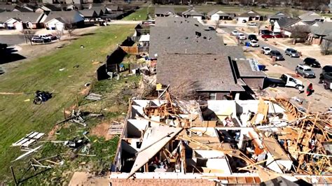 They assess the damage caused by a devastating tornado that hit the city of Norman, Oklahoma ...