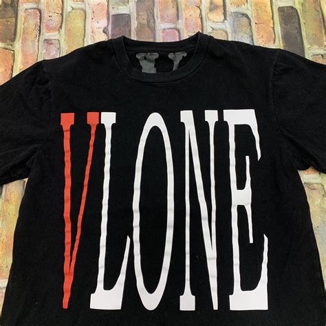 VLONE tee in black. No size fits like a mens M.... - Depop