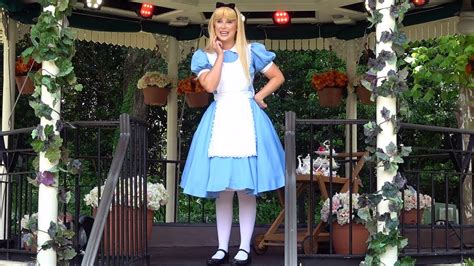 Alice from Alice in Wonderland Distanced Character Interaction at Epcot, United Kingdom Pavilion ...