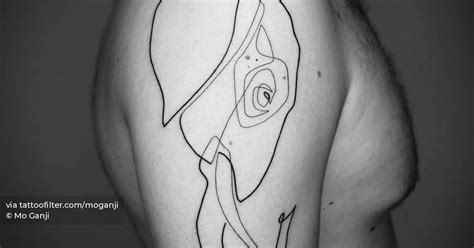 Abstract elephant portrait tattoo located on the upper