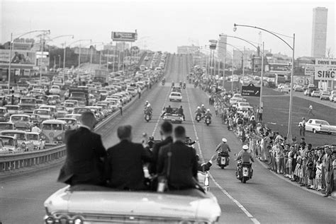 President John F. Kennedy's motorcade travels on the Gulf Freeway from Hobby Airport to Downtown ...