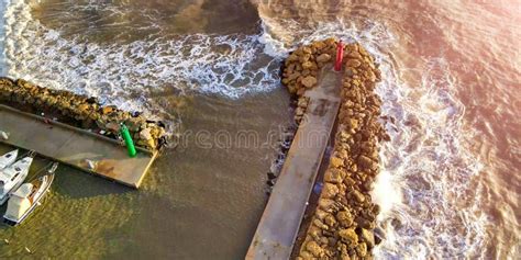 Lighthouse Along the Coast during a Storm. Aerial View from Drone Stock ...