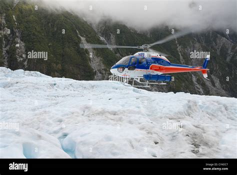 Helicopter landing on Franz Josef glacier. Westland Tai Poutini ...