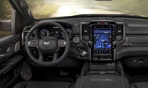 the interior of a vehicle with dashboard, steering wheel and touchscreens on display