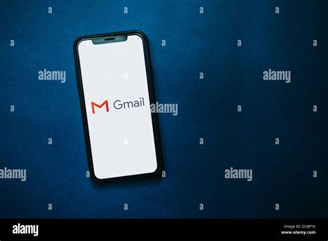 iPhone with Gmail app logo on the screen Stock Photo - Alamy