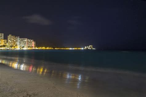 Waikiki beach at night Photograph by David Eisenberg