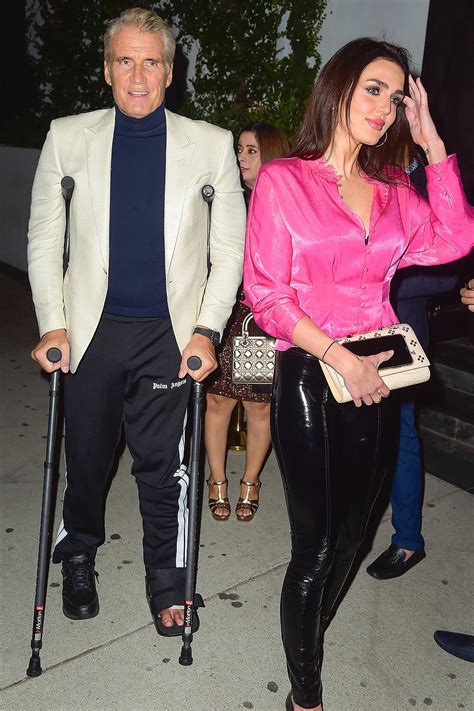 Dolph Lundgren Steps Out with Fiancée for 65th Birthday While on Crutches After Ankle Surgery