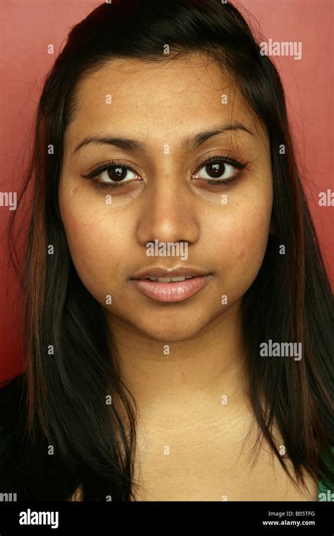 Pretty Sri Lankan girl with big brown eyes looking at camera Stock ...