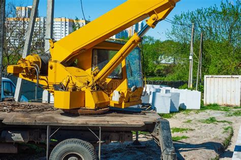 Mobile Crane on a Road and Tower Crane in Construction Site Stock Photo ...