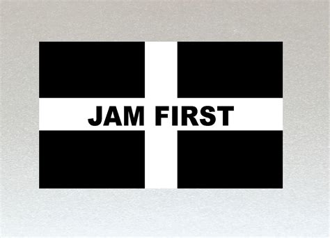 the jam first logo is shown in black and white, with a cross on it