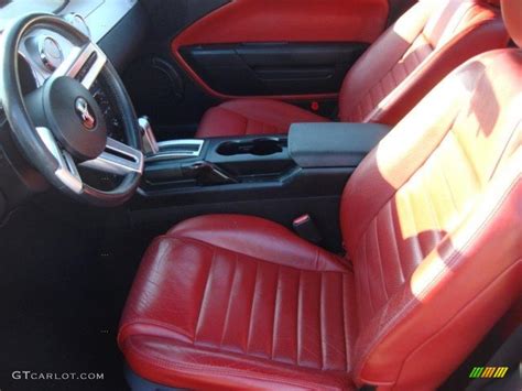 Red/Dark Charcoal Interior 2006 Ford Mustang V6 Premium Coupe Photo #47294873 | GTCarLot.com