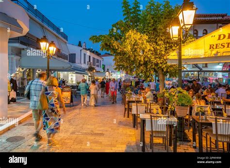 Busy street and nightlife in Skiathos Town, Skiathos Island, Sporades Islands, Greek Islands ...