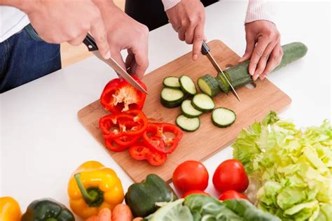 Chopping vegetables Stock Photos, Royalty Free Chopping vegetables Images | Depositphotos