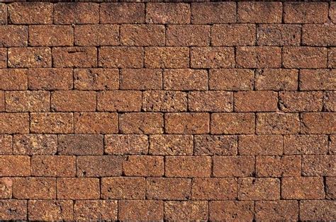 Premium Photo | Laterite stone wall surface red stone brick blocks ...