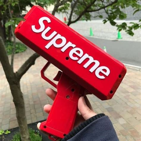 Supreme Money Gun, Men's Fashion, Watches & Accessories, Accessory holder, box & organizers on ...