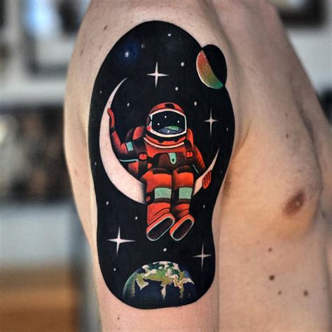 Surrealist/psychedelic astronaut tattoo on the right