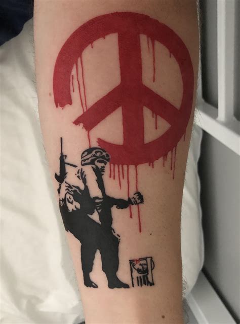 Banksy‘s “Peace not War“, done by Darcie at Studio 13, Cairns, Australia : r/tattoos