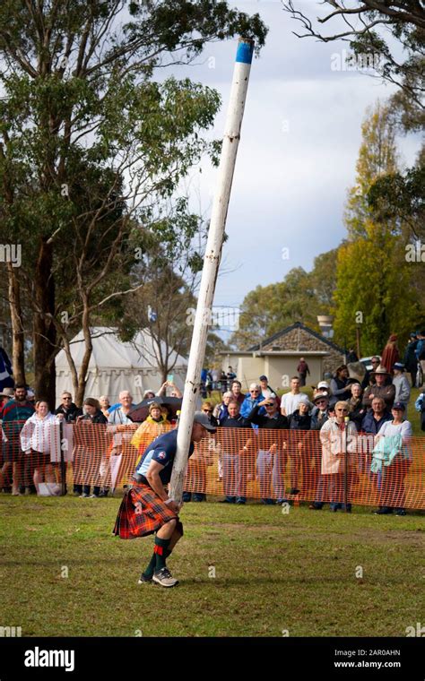 Tossing the Caber at Highland Games, Glen Innes Celtic Festival NSW ...