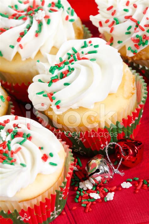 Holiday Cupcakes With Vanilla Frosting, Red And Green Sprinkles Stock ...