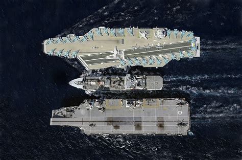 Rendering of the French Navy Next Generation Aircraft Carrier conduction refueling at sea with ...