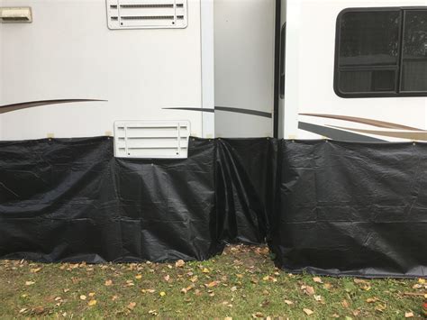 How We Made $200 DIY Vinyl RV Skirting for Winter Camping