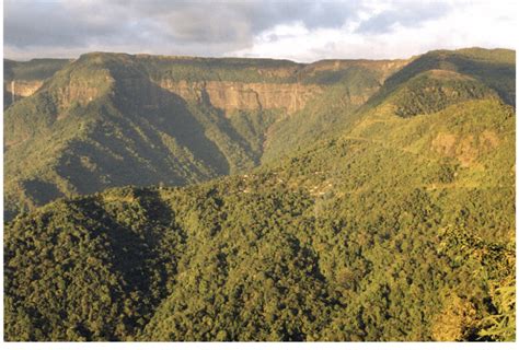 Dissected southern margin of the Meghalaya plateau with headward eroded... | Download Scientific ...