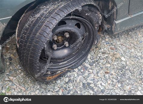 Destroyed Blown Out Tire Exploded Shredded Damaged Tire Modern Automobile Stock Photo by ...