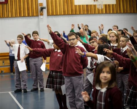 Students at St. Stanislaus School in Chicopee bless members of the New ...