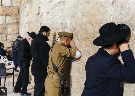 January 13, 2019: Jewish men praying at the wailing wall known also as the western wall in the ...