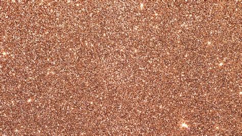 Premium Photo | Brown glitter texture for a background.