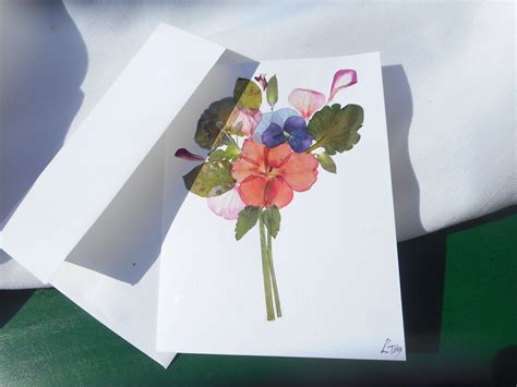 Special and Handmade Greeting Card. A Bouquet of real pressed flowers and leaves. Card fold and ...