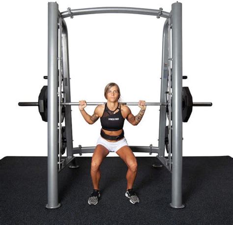 Smith Machine Squats: Correct Form, Benefits & Debate - SET FOR SET