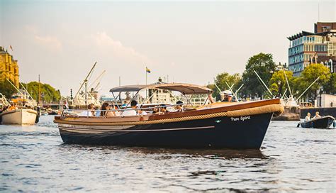 Private boat tour through Amsterdam's canals - Pure Boats Partner