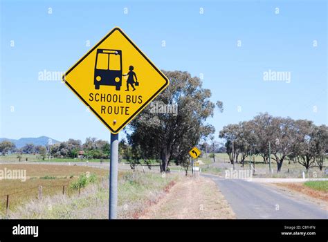 School bus sign on rural road Stock Photo - Alamy