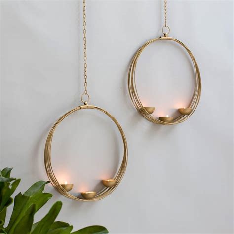 hanging gold crescent tea light holder by the forest & co | notonthehighstreet.com