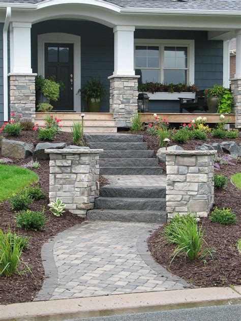 Dramatic Entrance with Paver Walkway and Stone Steps