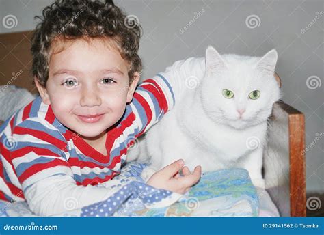 A boy and a cat stock photo. Image of hair, feelings - 29141562