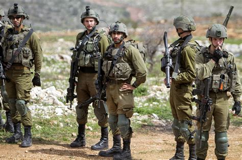 Israeli forces arrest 12 Palestinians in West Bank anti-terror raids ...