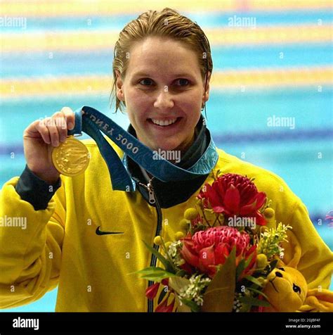 Australia's 'Madame Butterfly' Susie O'Neill shows off her Gold Medal ...