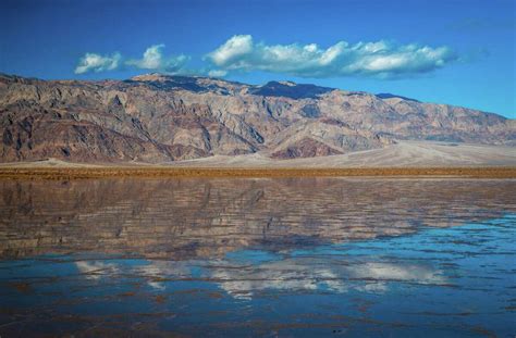 Rare 10-mile-long lake forms in Death Valley after heavy rains and flooding