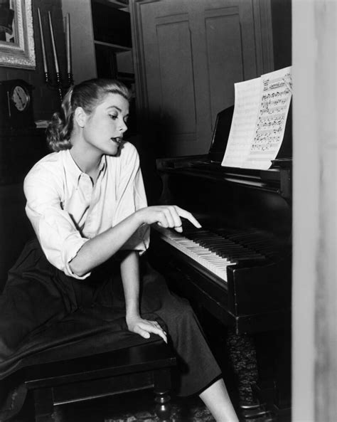 Grace Kelly on the piano (1954) - Photographic print for sale