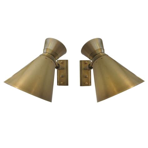 Pair of Antiqued Brass Wall Sconces at 1stdibs