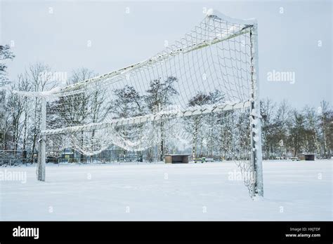 Snow covered soccer field with goal during winter Stock Photo - Alamy