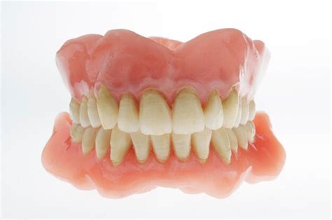 Premium Photo | Set of dentures artificial teeth