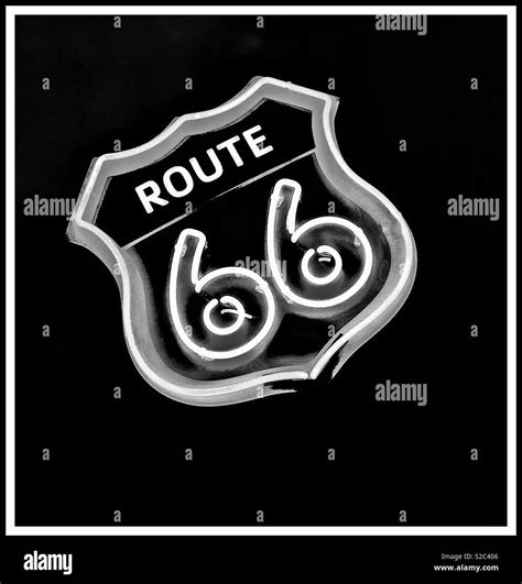 Neon Route 66 road sign Stock Photo - Alamy