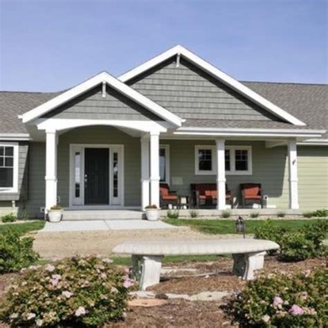 Picture Of ranch styled house with a gable roof and gabled front porch