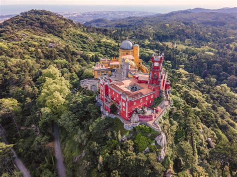 Aerial view of Pena Palace, a colourful Romanticist castle building on ...