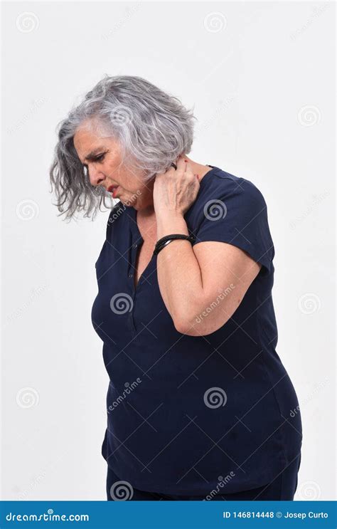 Woman with pain on nape stock photo. Image of painful - 146814448