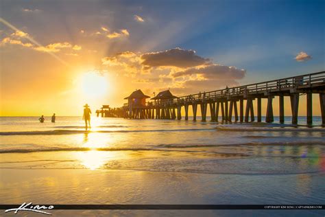 Naples Pier Sunset at Gulf Coast People on Beach