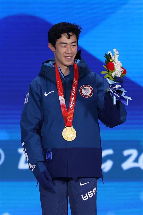 Nathan Chen celebrates Elton John’s greatest hits while winning Olympic ...